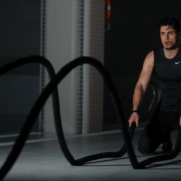 Women in a fitness class doing stretching and mobility exercises